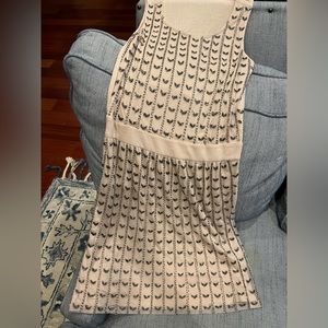 Peach fitting dress with sequin style knitted in to glam up that evening.